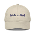 Pointe au Baril Cap in Oyster with navy script embroidery, front view