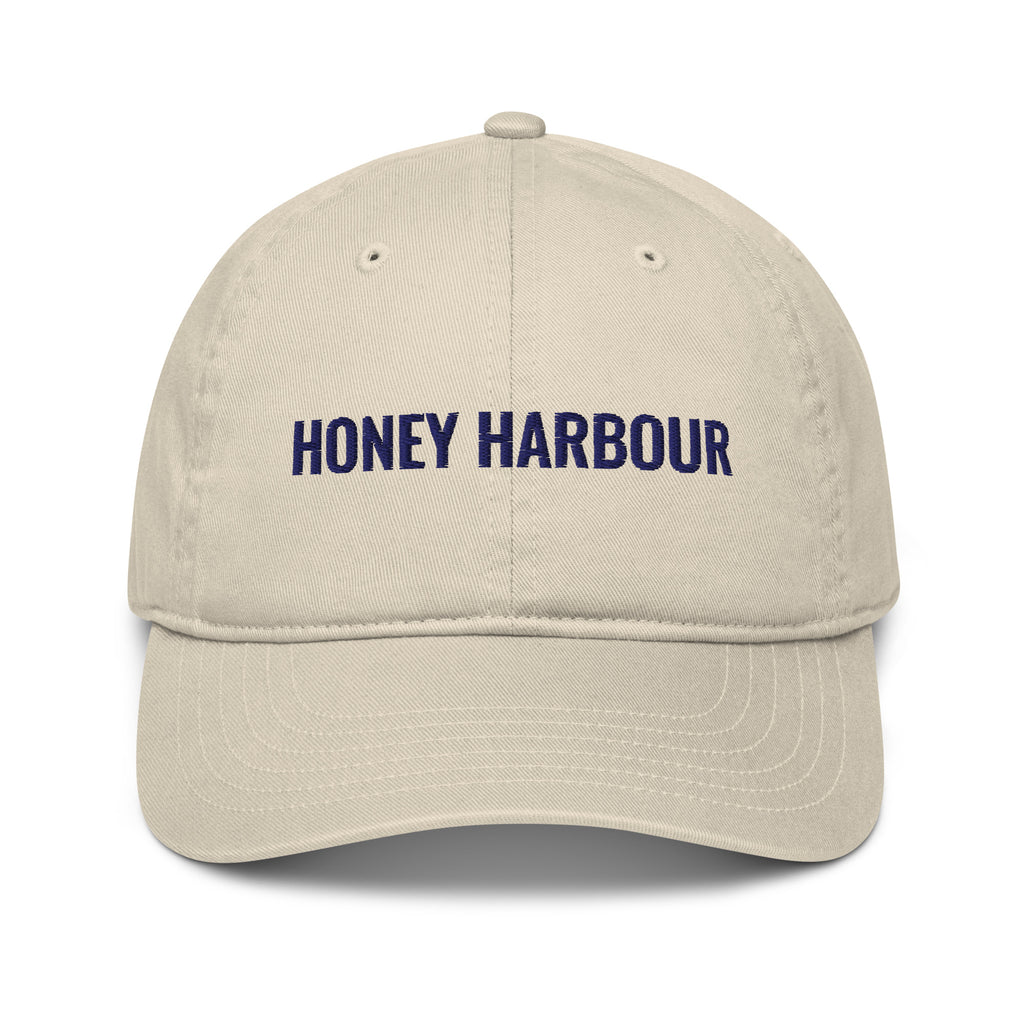 Honey Harbour Cap in Oyster with navy embroidery, front view