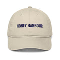 Honey Harbour Cap in Oyster with navy embroidery, front view