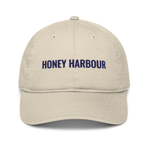 Honey Harbour Cap in Oyster with navy embroidery, front view