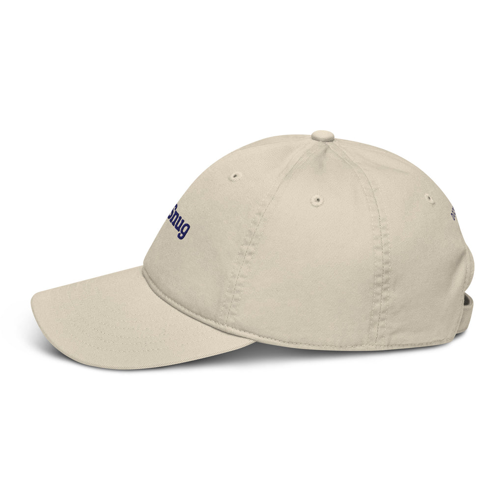 The Snug Cap in Oyster with navy embroidery, left-side view